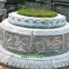 Mẫu mộ đá tròn chạm cảnh chạy xung quanh mộ